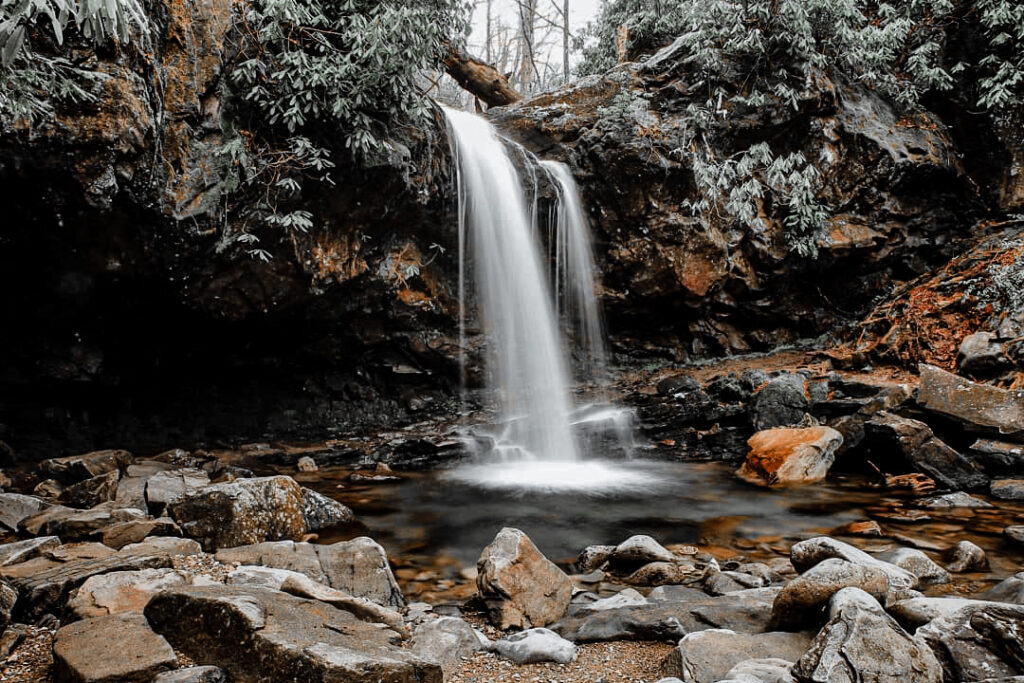 Grotto Falls is breathtaking in Gatlinburg! This waterfall emcompasses a pass through behind the falls creating one of the most memorable experiences when exploring Gatlinburg!