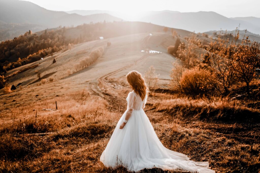 Gatlinburg Wedding Venues Pretty bride walking on a mountain meadow
